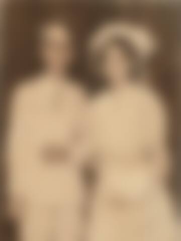 A blurred vintage wedding photograph of a couple